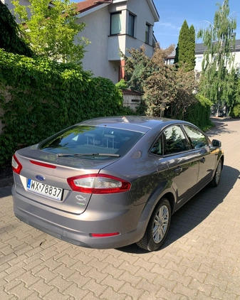 Ford Mondeo cena 34500 przebieg: 120000, rok produkcji 2014 z Warszawa małe 92